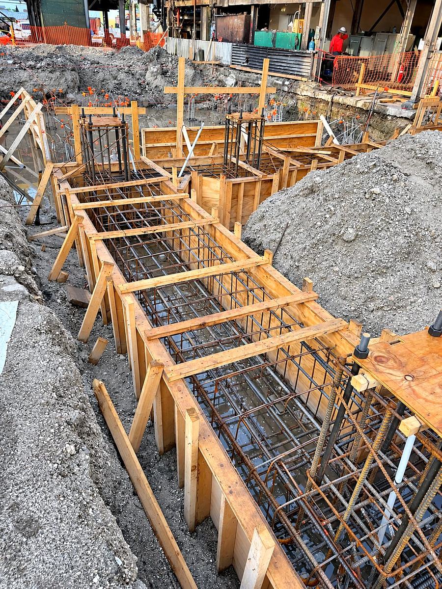 Foundation excavation with stem wall formwork and tied rebar
